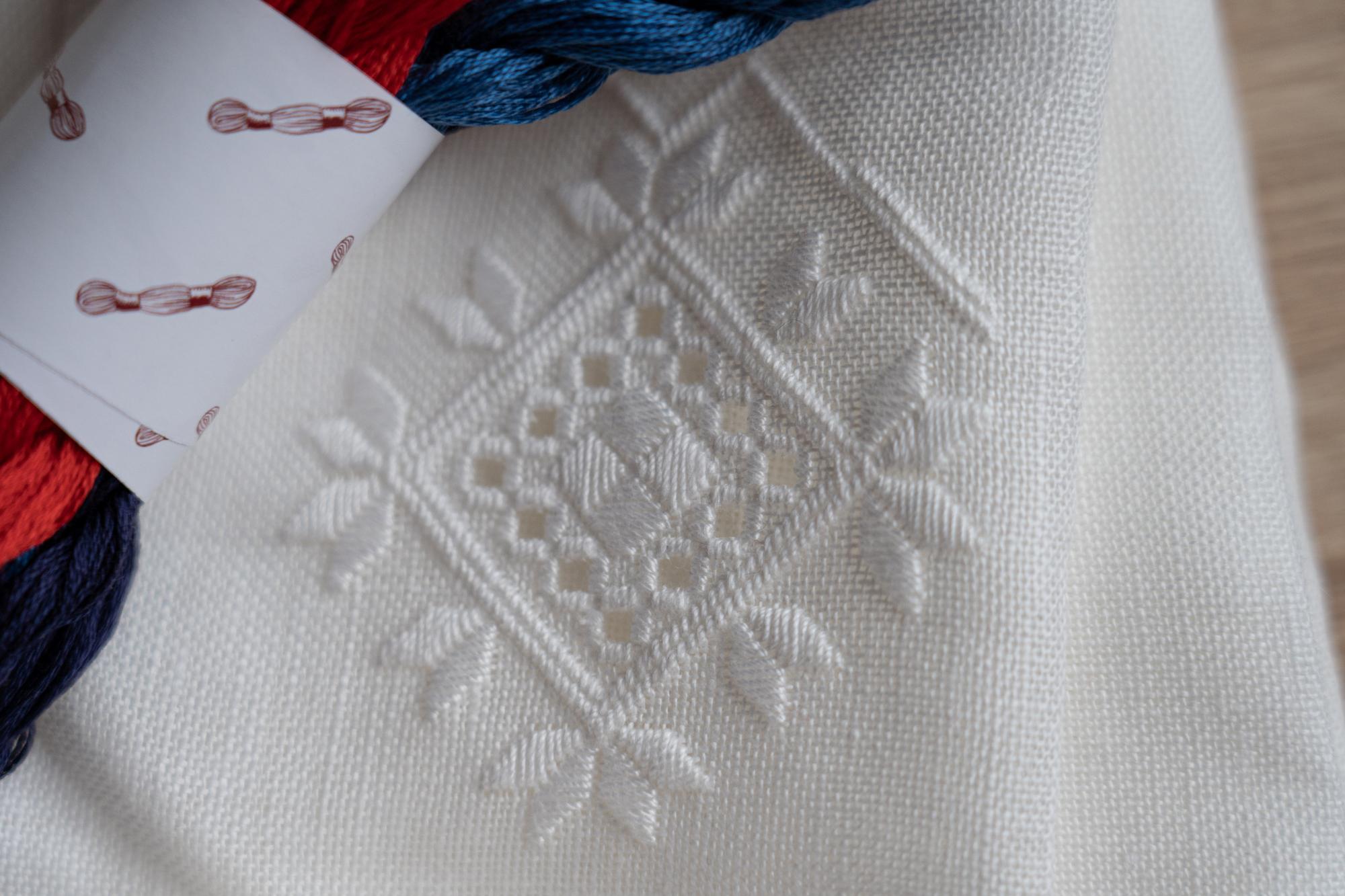 close-up modern embroidery on linen